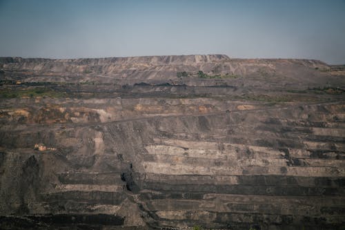 Gray Rock Formation Under Blue Sky