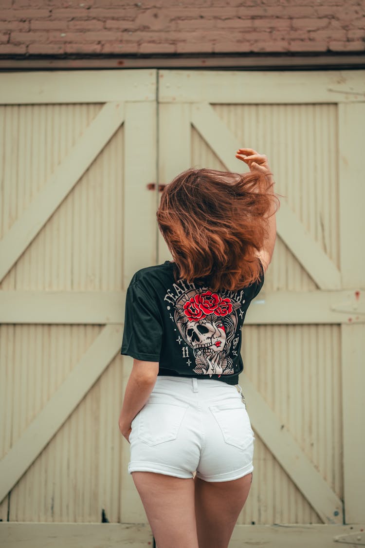 Back View Of A Woman Wearing Shorts