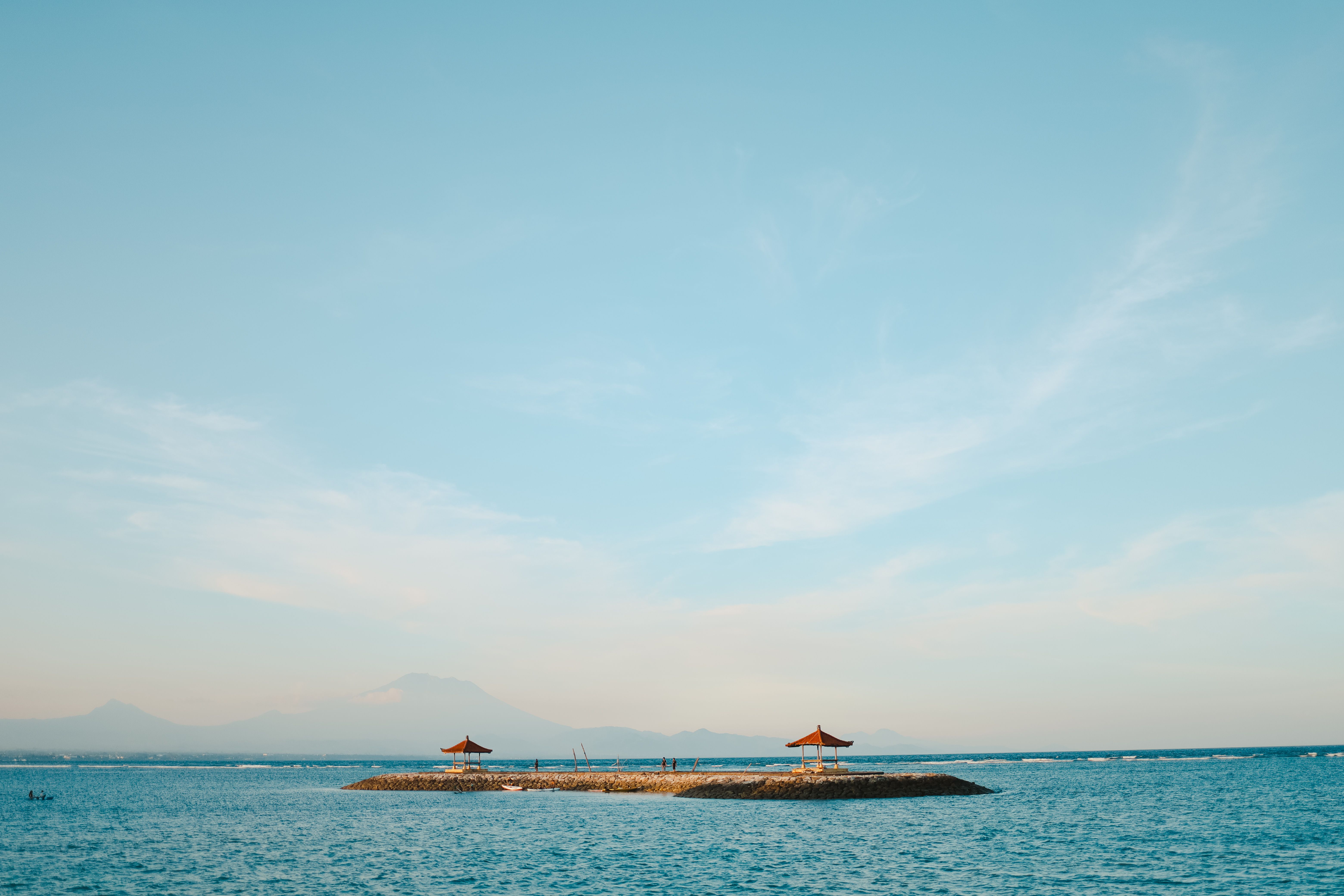 tranquil beach scene in Sanur, clear blue water