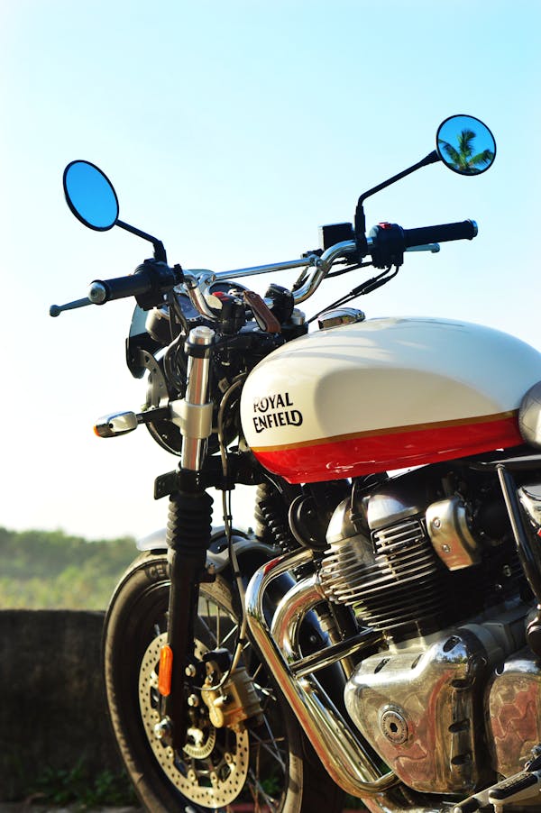 White and Red Royal Enfield Motorcycle 