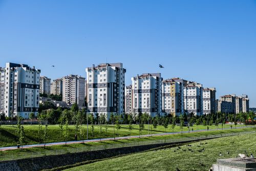Free A view of contemporary apartment buildings amid green spaces in Istanbul, Turkey. Stock Photo