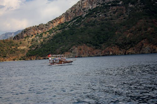 ada, dağ, deniz içeren Ücretsiz stok fotoğraf