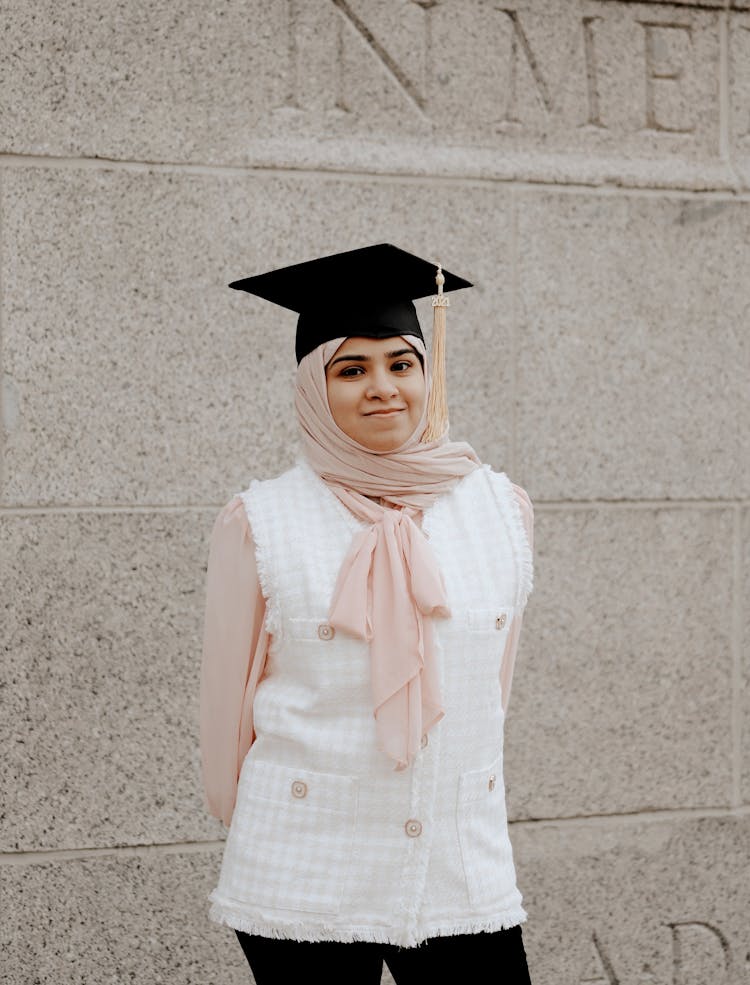 Woman In A Hijab Wearing A Mortarboard Hat