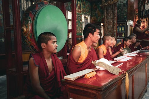 Free Monks in Red and Yellow Robe  Stock Photo