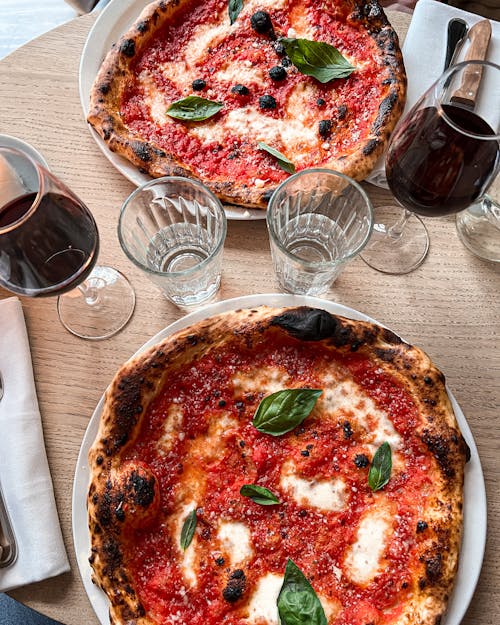 Delicious Pizza on a Wooden Table Top 