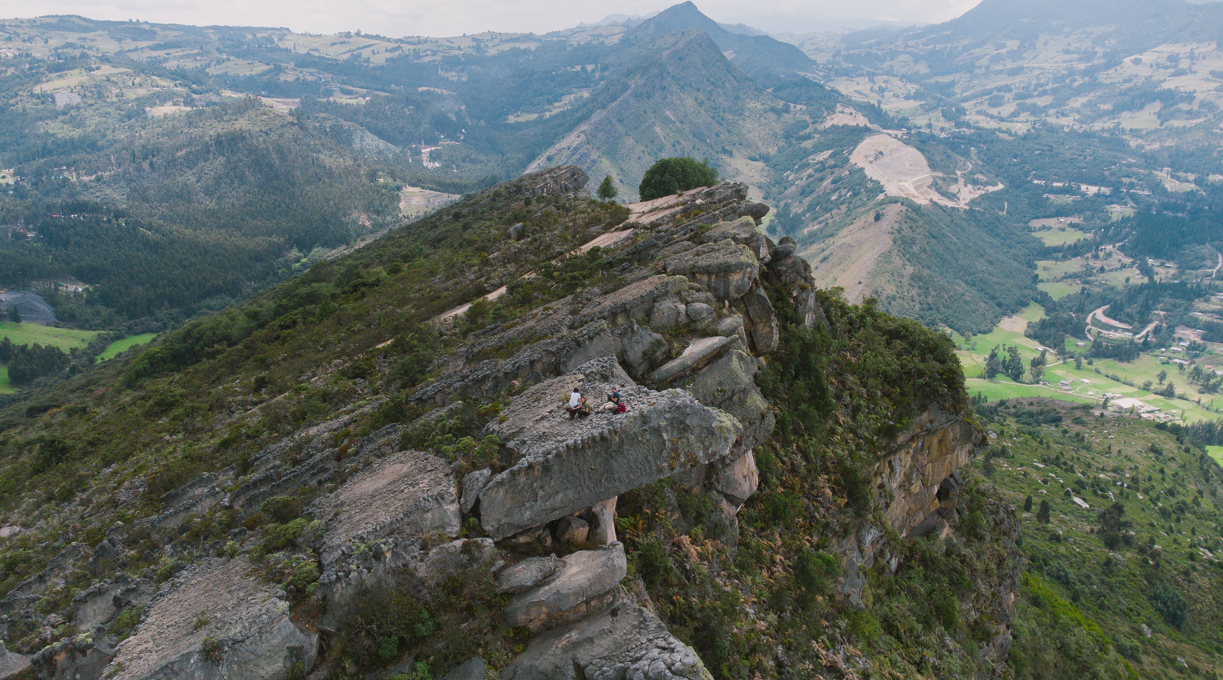 Spectacular Private Tour to La Manuela Park with Helicopter Flight Review 2026 - Breathtaking aerial view of Colombian mountain landscape, capturing nature's beauty.