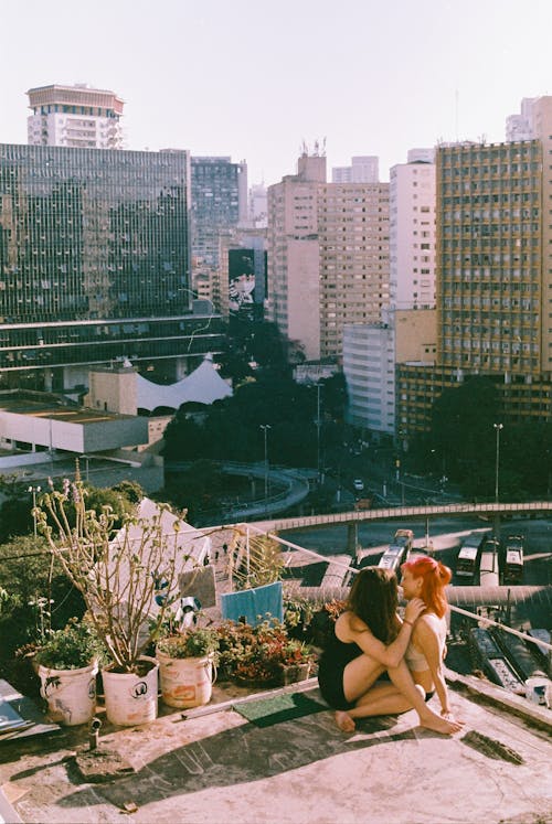 A Couple Close Together on the Roof