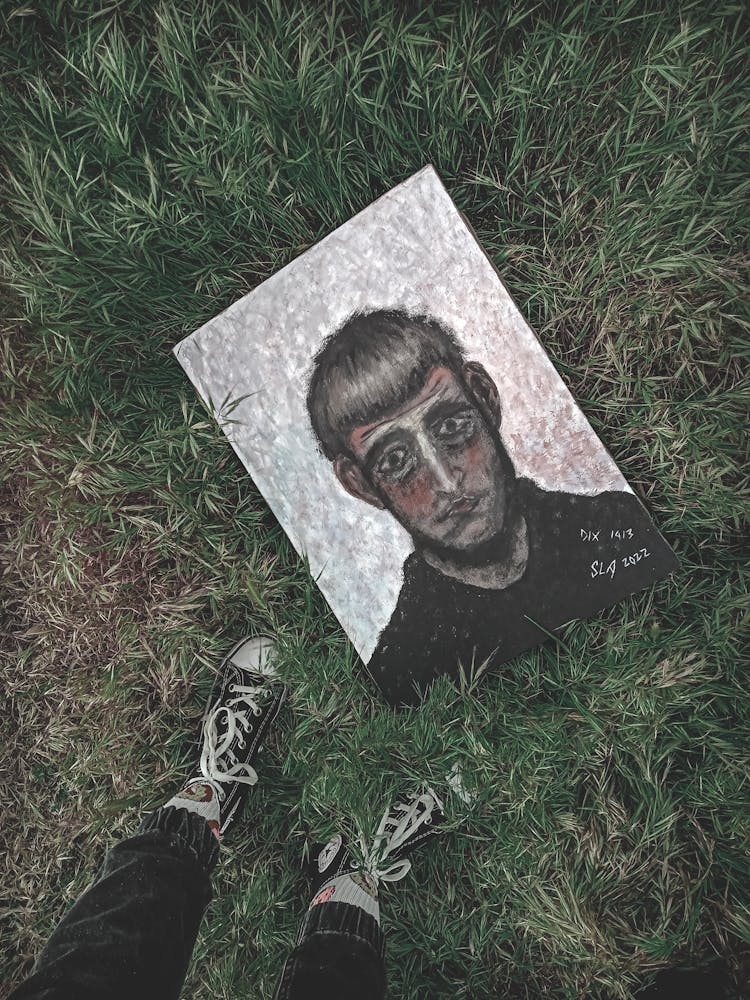 A Canvas Painting On The Grass