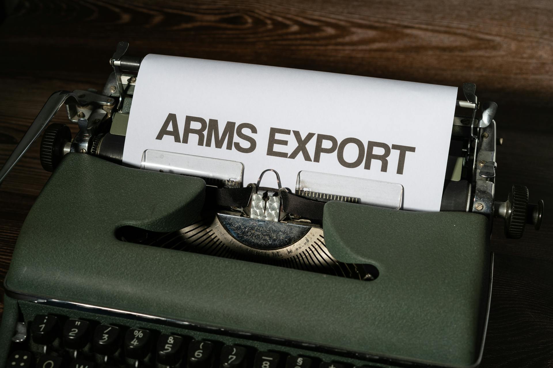 A White Bond Paper with Arms Export Text on a Typewriter