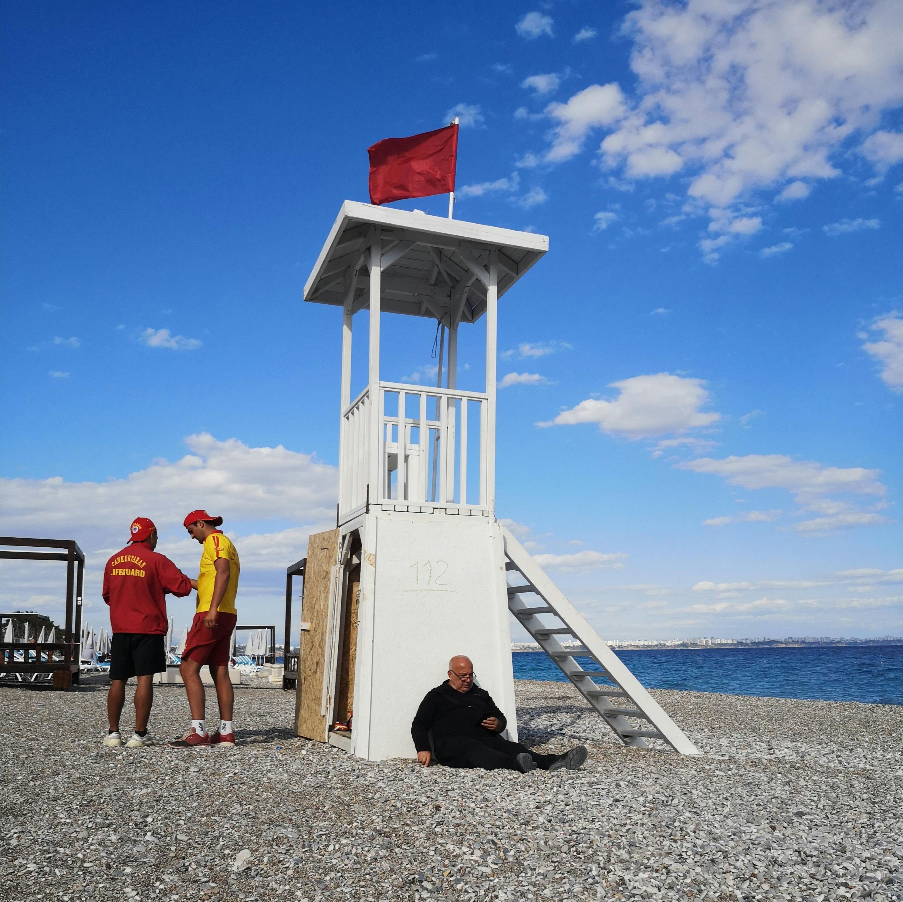 Lifeguard station with red flag on Konyaalti Beach, Antalya