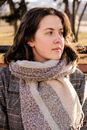 Woman in Black and White Plaid Shirt Wearing Scarf