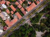 Aerial View of Brown and White Concrete Houses