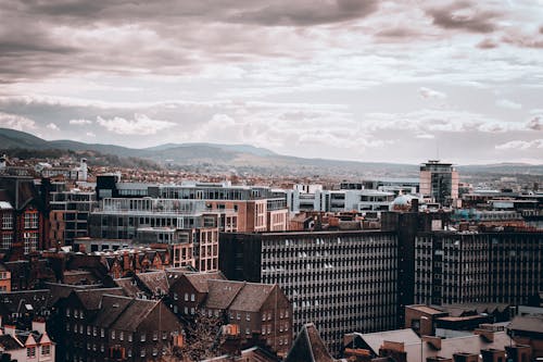 Aerial Photography of City Buildings under the Cloudy Sky