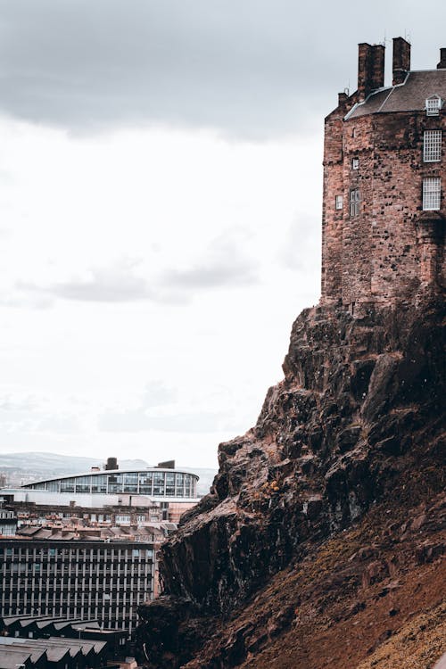 Brown Concrete Building on Brown Rocky Mountain