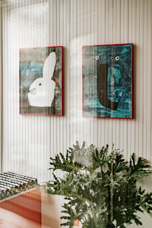 Paintings Hanging on a Wall in a Modern Interior 
