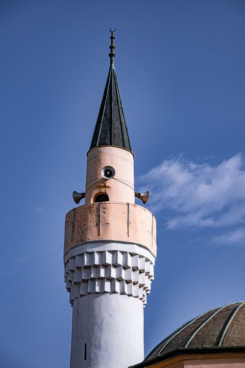 Free Vertical shot of the Arap Mosque minaret against a clear blue sky in Novi Pazar, Serbia. Stock Photo