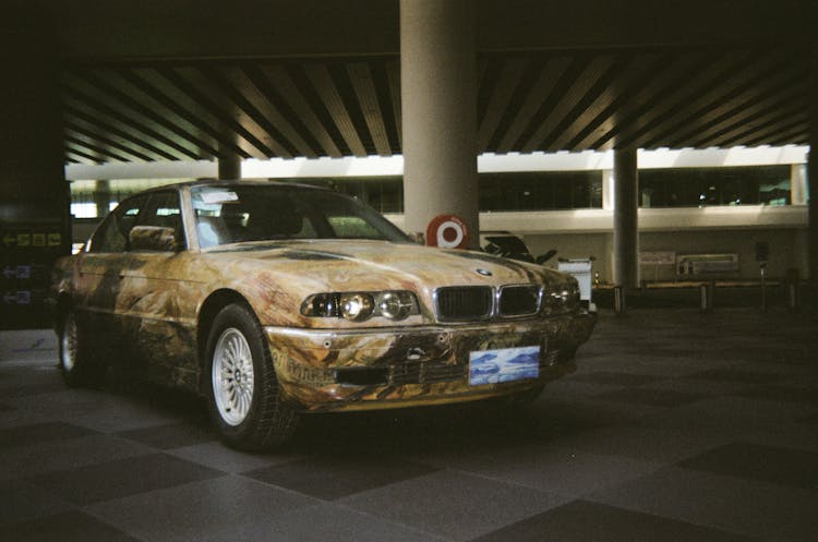 Sedan Car Parked In A Garage