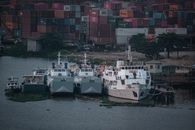 White and Red Cargo Ship on Dock