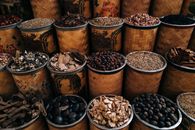 Brown Wooden Round Container With Black and White Stones