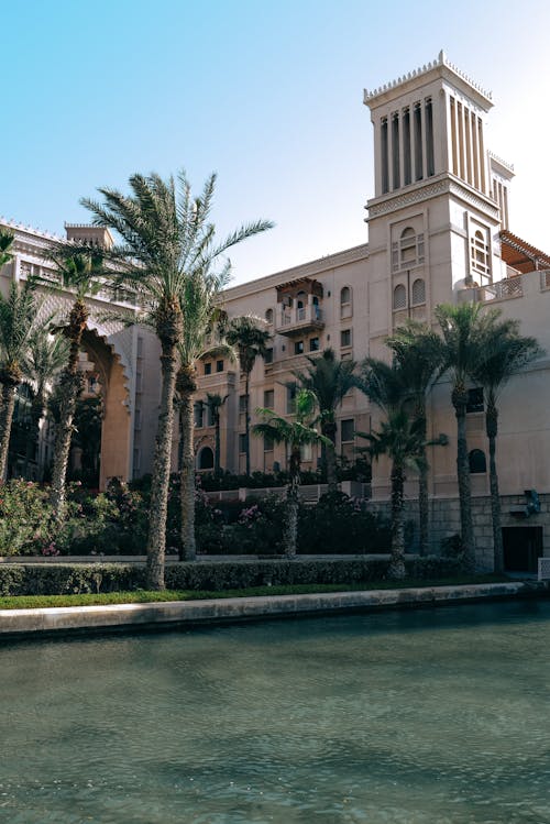 Free Hotel Among Palm Trees in Dubai Stock Photo