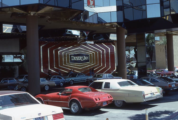 Luxury Cars Standing By Expensive Hotel