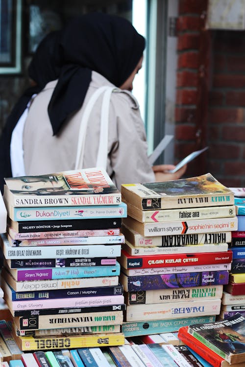 Stacks of Books on City Outdoor Market