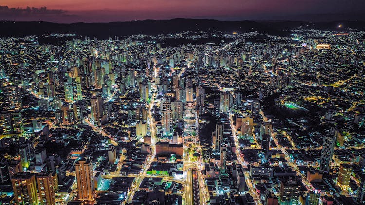 City Illuminated At Dusk