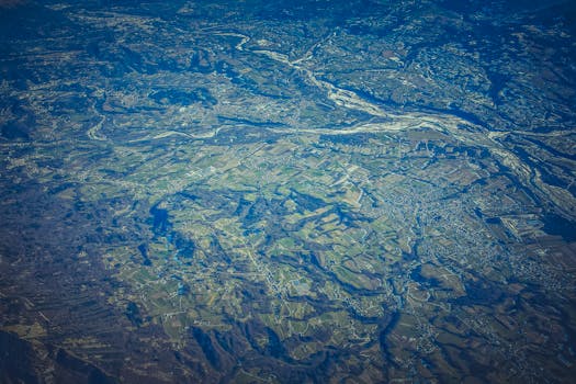 A breathtaking aerial view capturing nature's beauty, with rivers winding through the picturesque landscape.