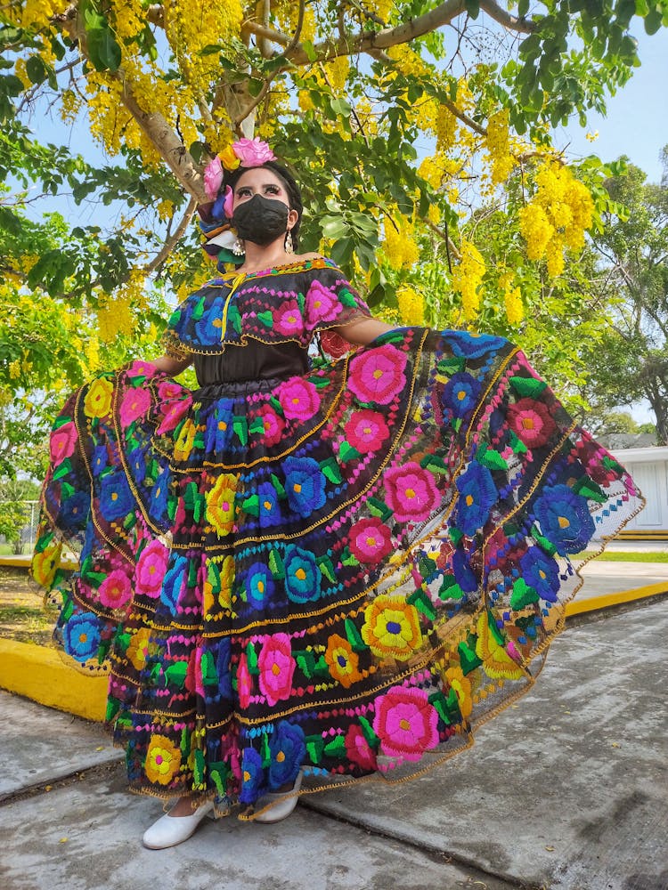 Woman Posing In Colorful Dress