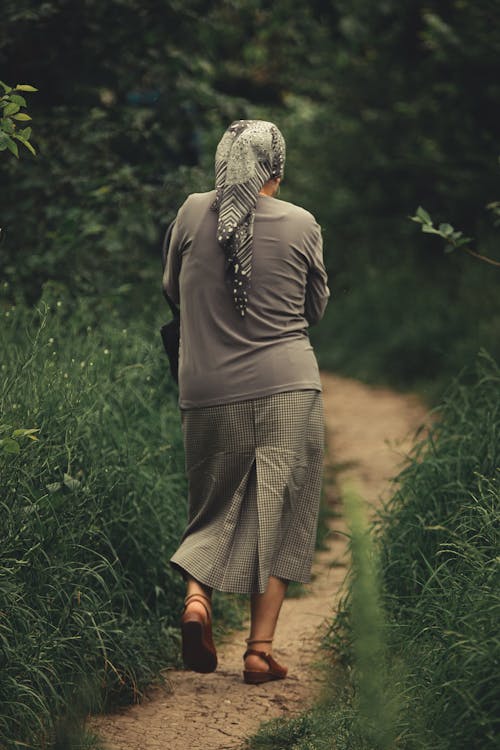Back View of a Woman while Walking