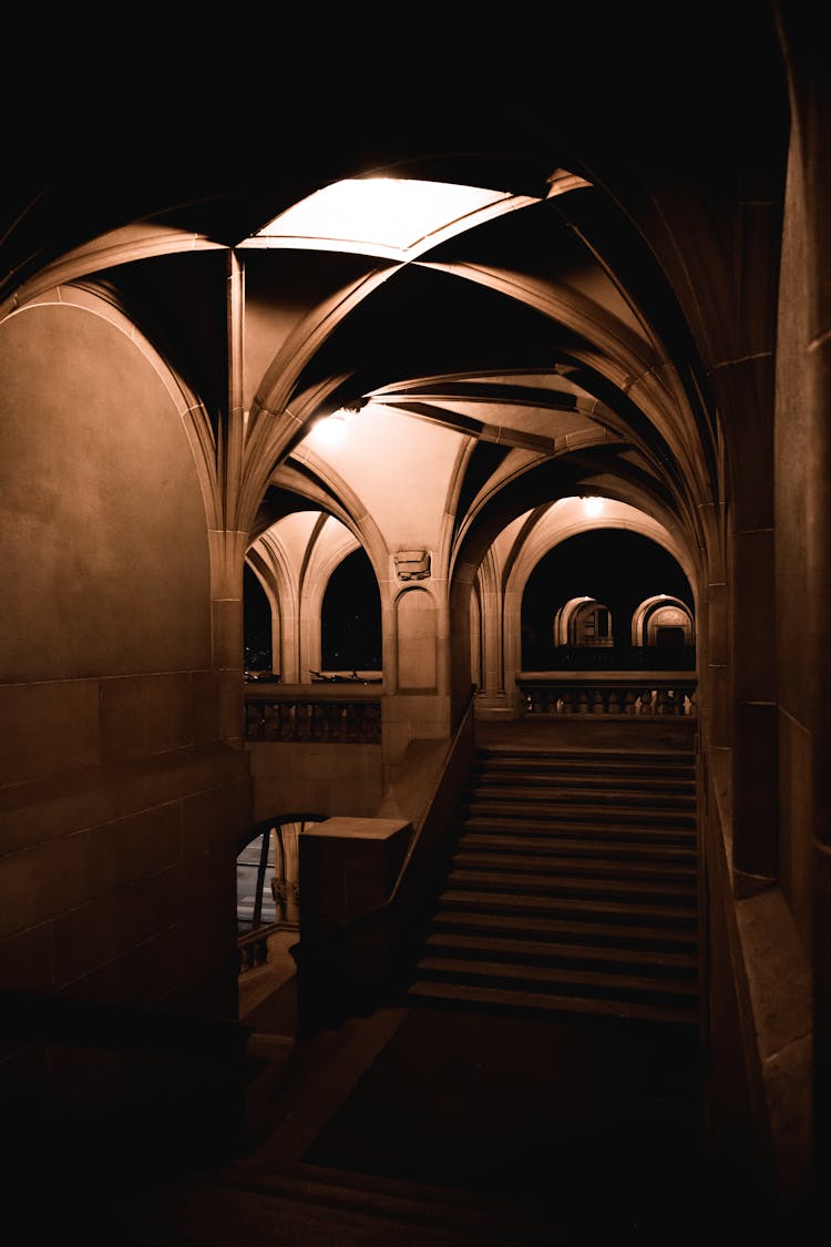 Brown Wooden Stairs Inside Building