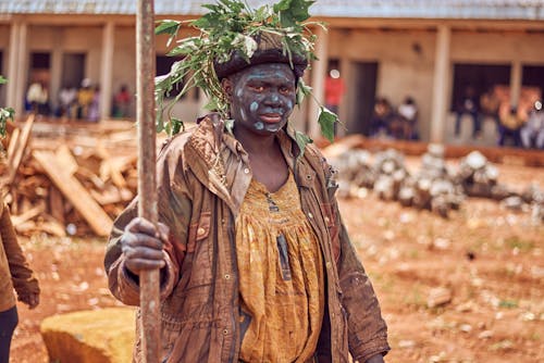 Person in a Costume during a Traditional Tribal Ceremony 