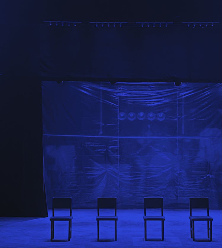 Chairs On A Stage 