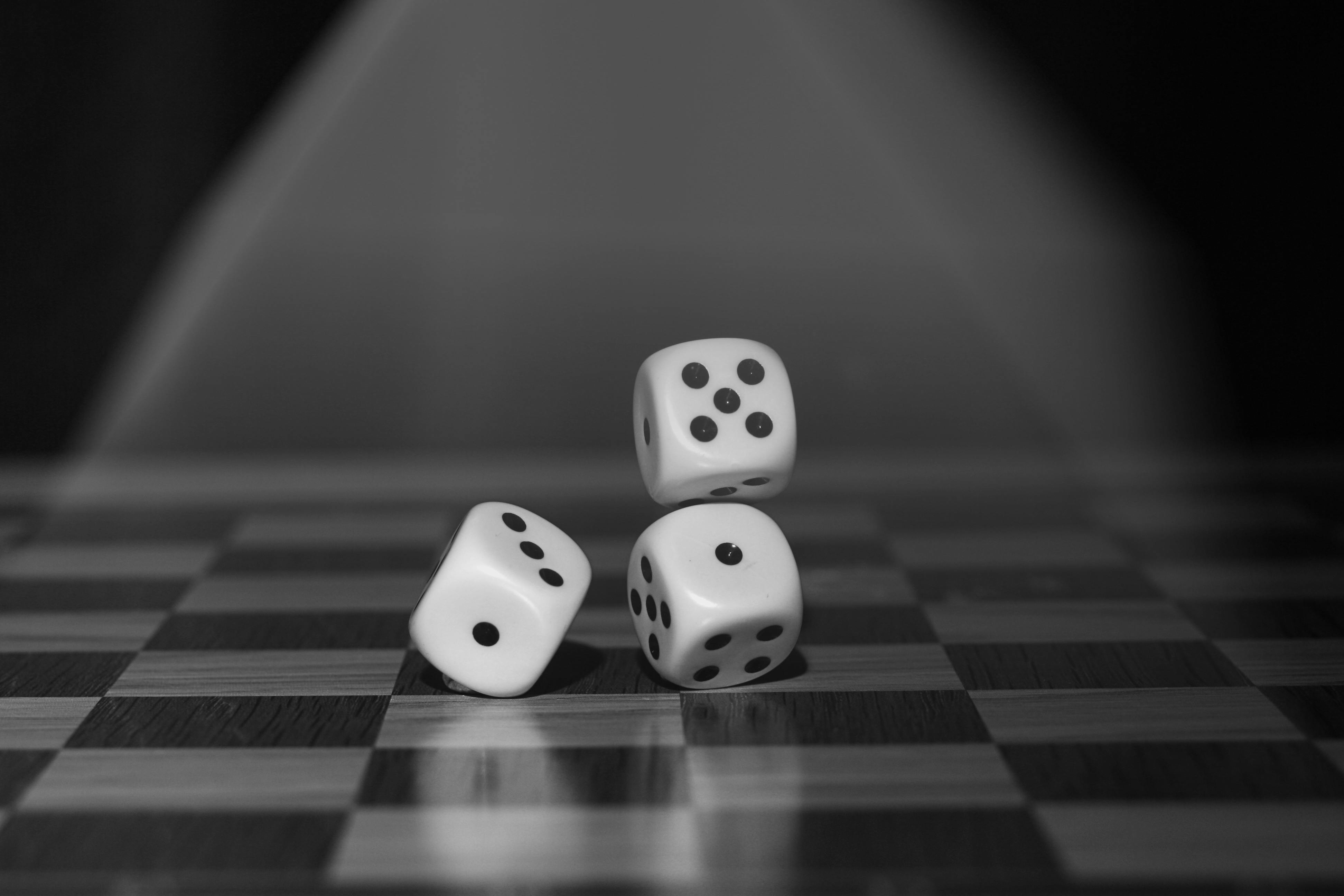 White Dices on Checked Wood