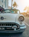 White Classic Car in a Parking Lot