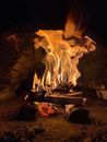 Fire on Brown Wooden Table