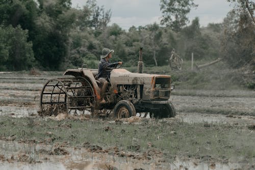 A Man Driving a Tractor