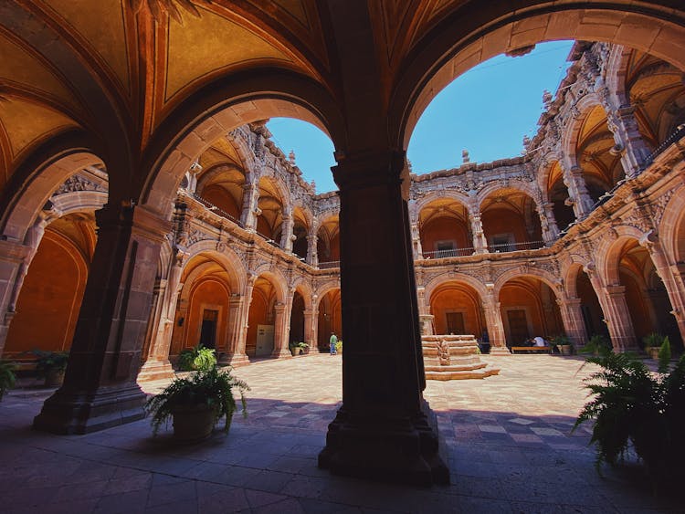 Yard In Historic Old Building With Arches