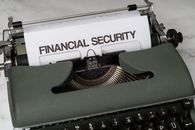 Green and White Typewriter on Green Table