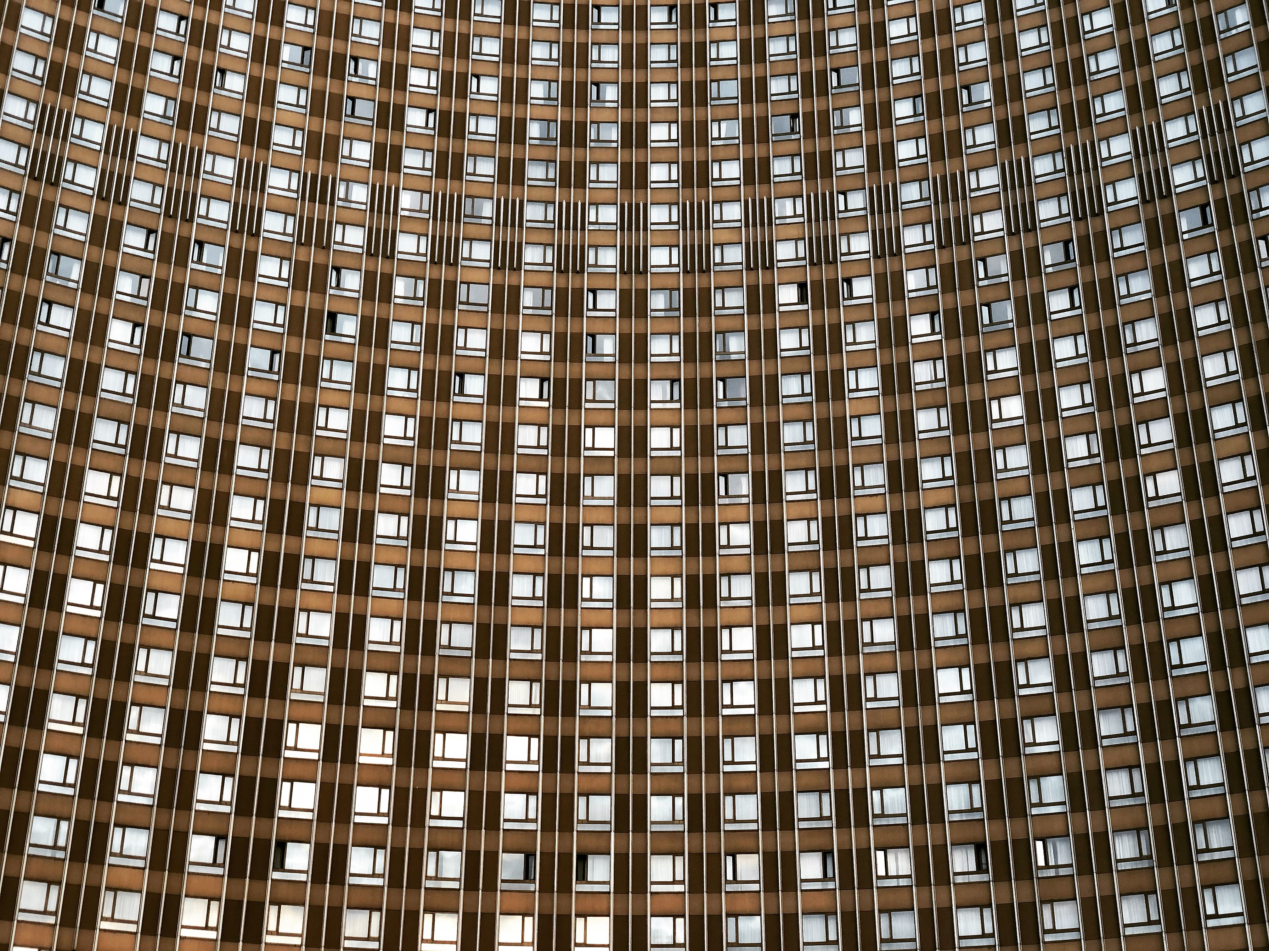 Modern City Building with Numerous Windows · Free Stock Photo