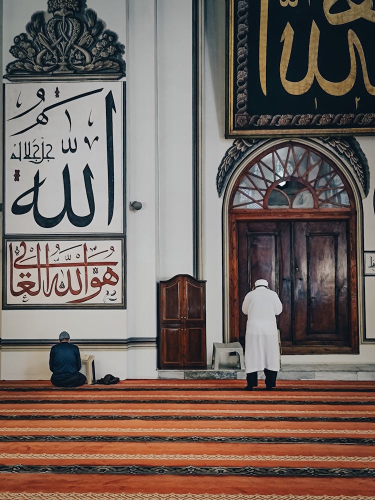 Photo Of People Praying In A Mosque