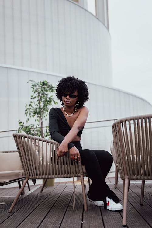 Portrait of a Woman Sitting in a Chair