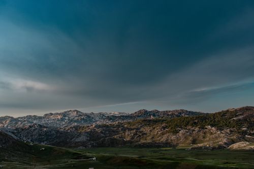 Free A vast scenic mountain view under a clear blue sky in Nikšić, Montenegro. Stock Photo