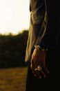Person Wearing Silver and Gold Ring