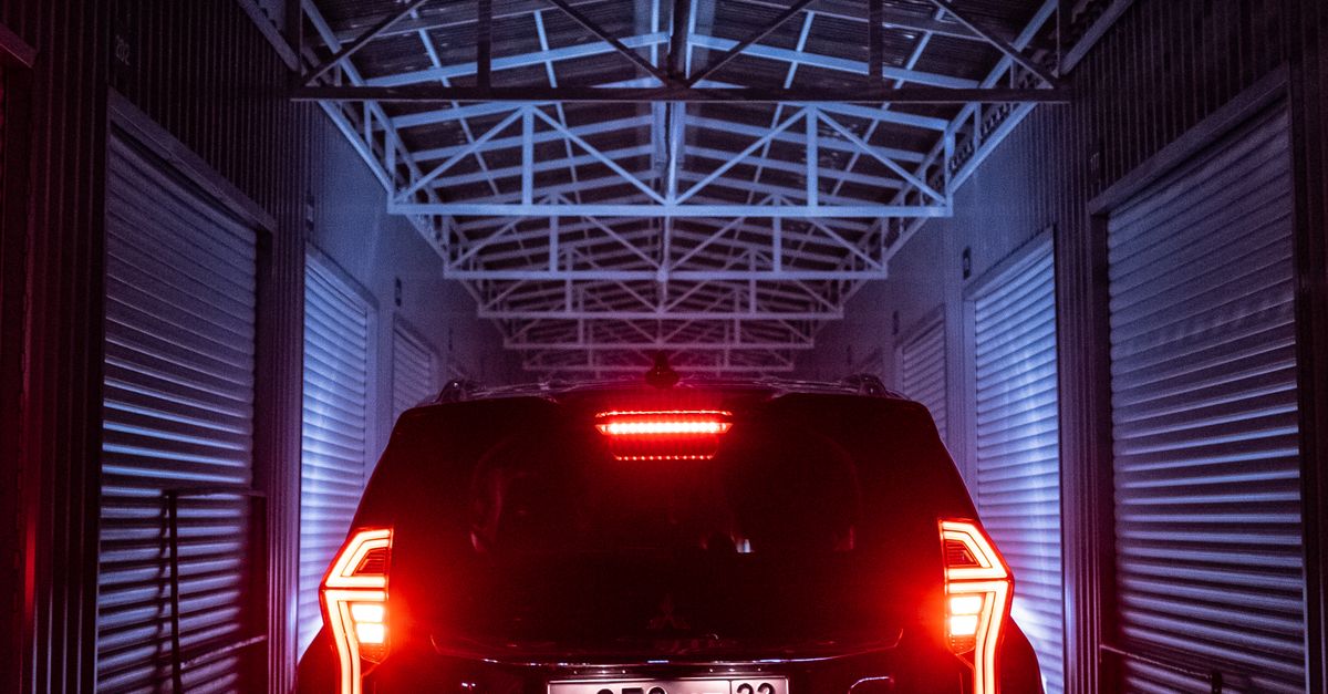 Back View Of A Car At Night Free Stock Photo back-view-of-a-car-at-night-free-stock-photo