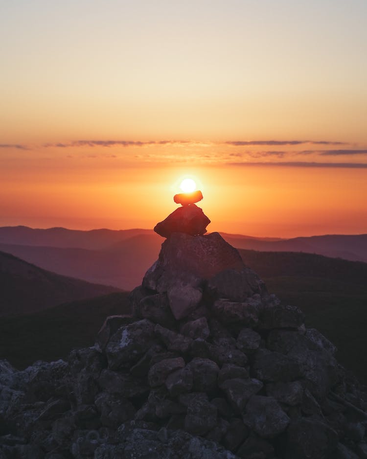 Sunlight Over Stacked Rocks