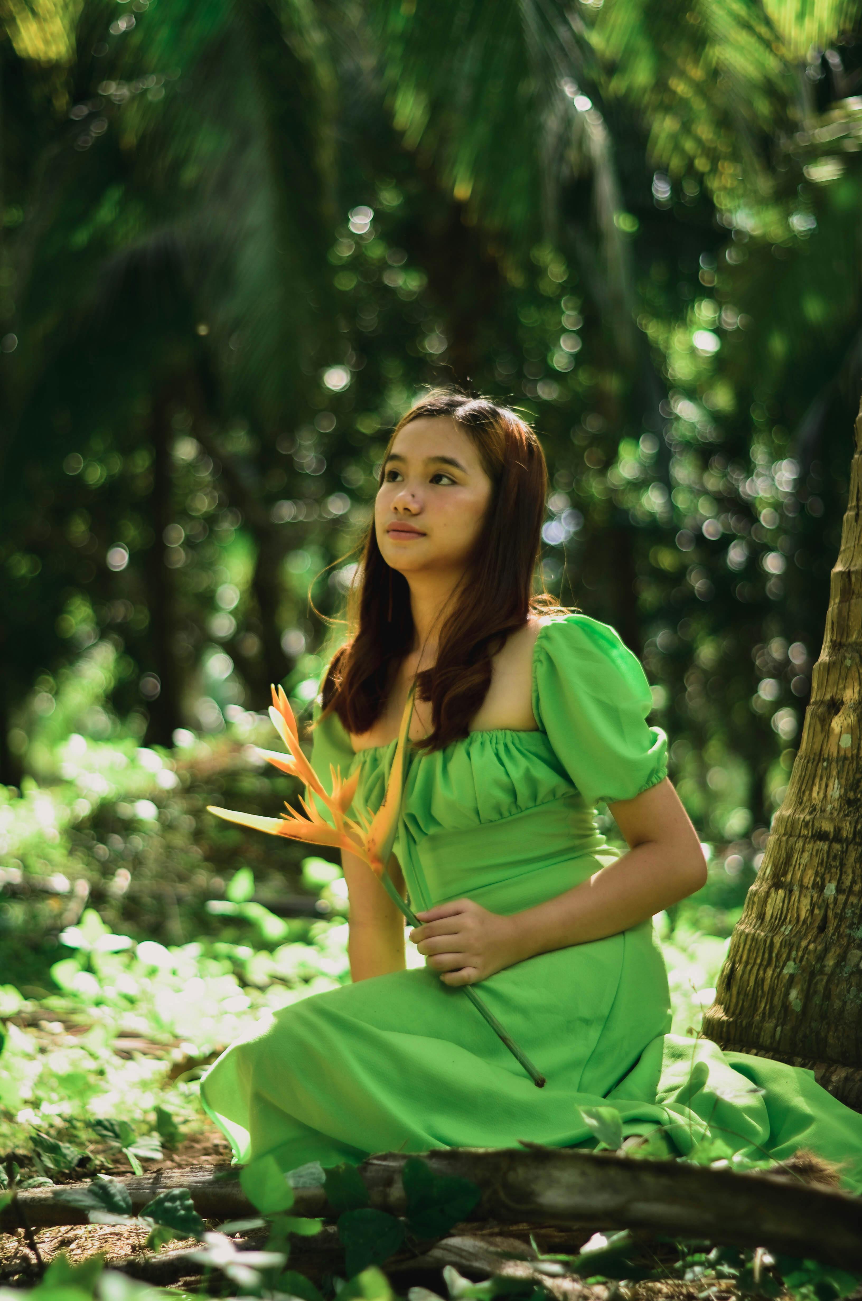 Portrait of a Girl in a Green Dress  Free Stock Photo