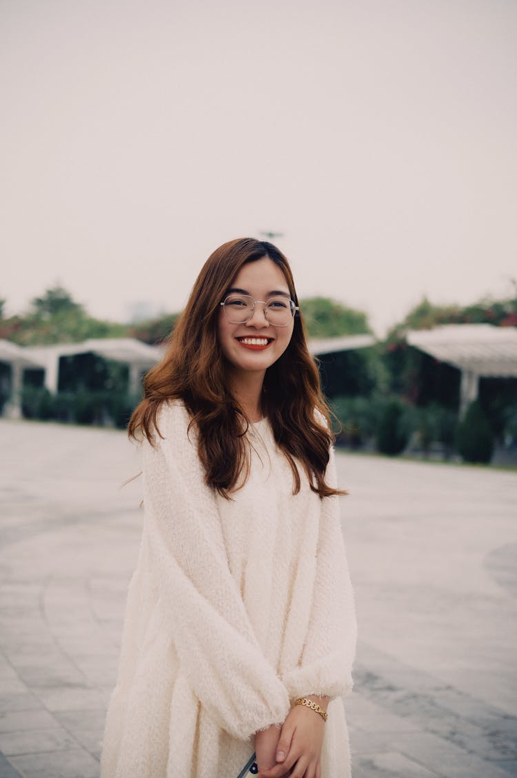 Radiant White Dress Girl Frolicking In The Park