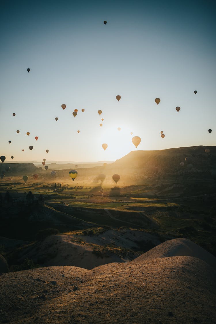 Sunlight And Balloons Over Cappadocia In Morning