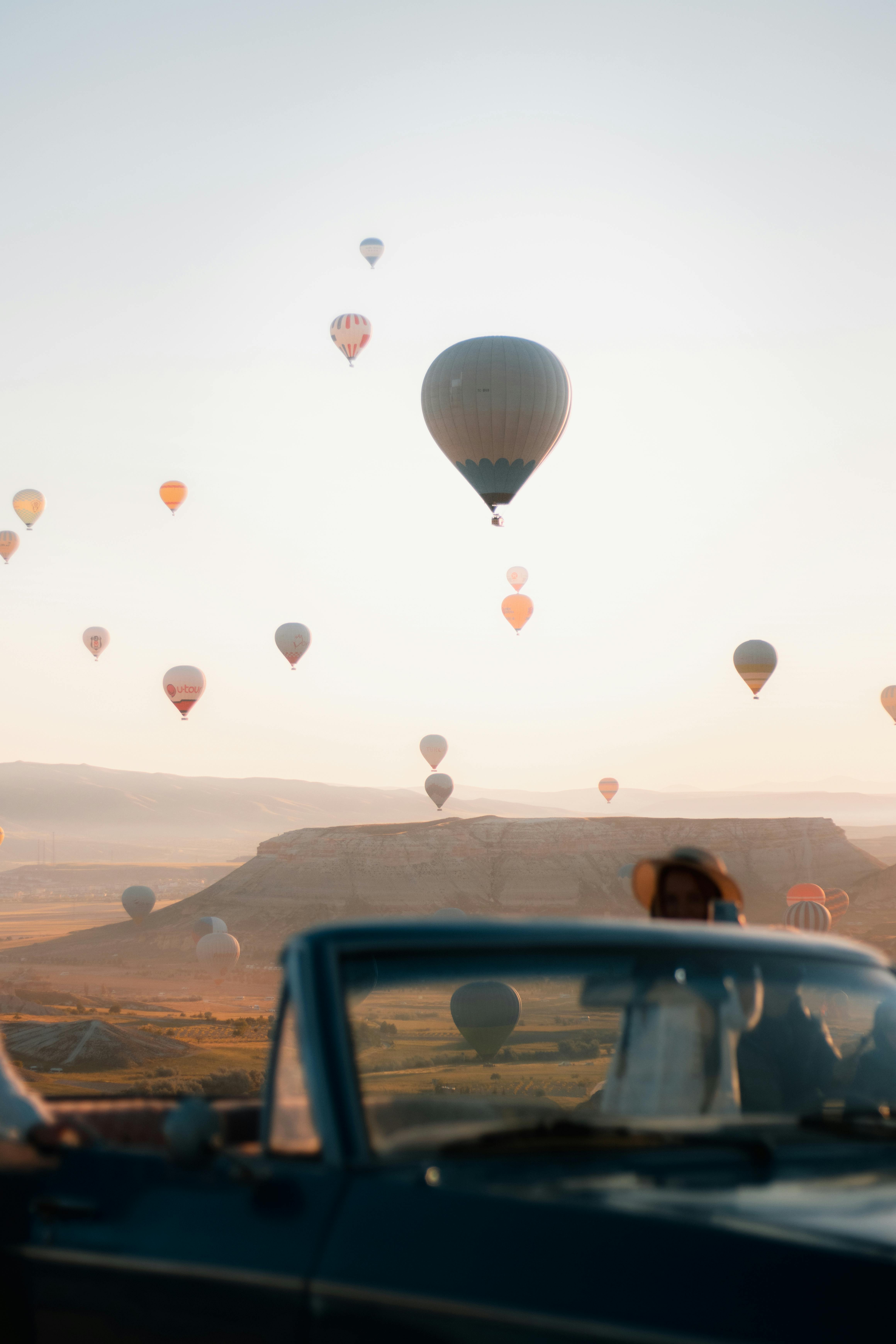 Sunlight over Balloons in Cappadocia · Free Stock Photo